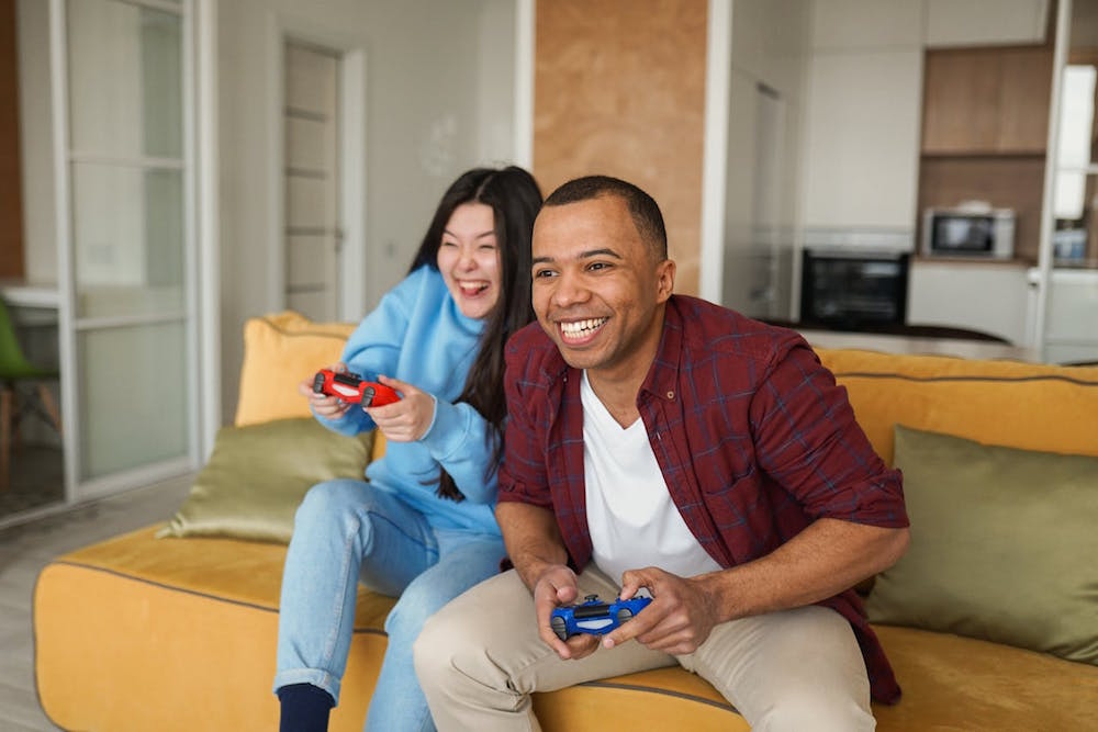 happy couple playing game